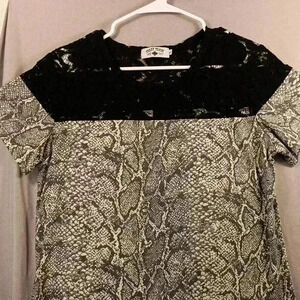 "CRAZY TRAIN"‎ Ladies Lace top snake skin bottom. Size Large Short Sleeve